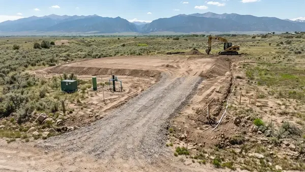 Rural Costilla County property with house pad, gravel access, water infrastructure, and coordinated space for septic and future development